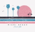 Miami Beach, Florida t-shirt design with flamingo and palm trees. Typography graphics for t shirt with stripes and grunge.